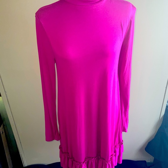 Long sleeve dress with tier ruffles on the bottom, length is passed the knee. - Picture 2 of 6